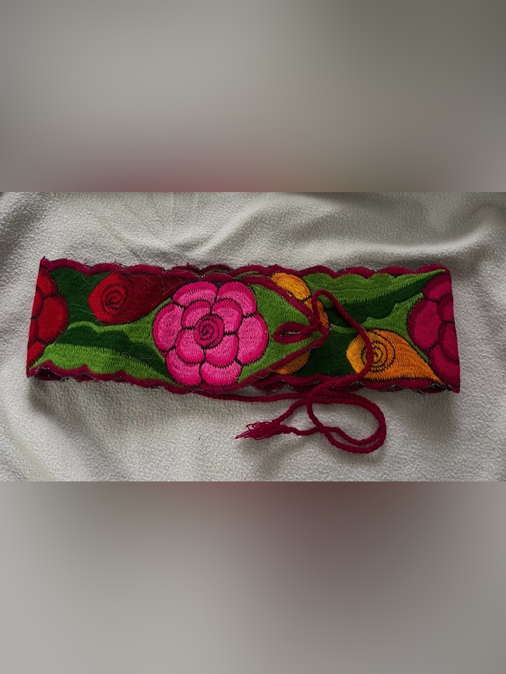 Handcrafted Floral Embroidered Mexican Belt in Pink and green and yellow .